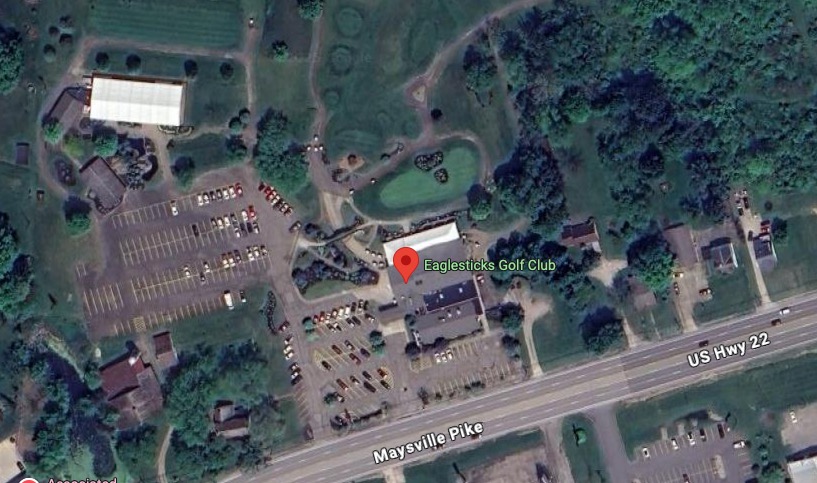 Parking-lot view toward the EagleSticks clubhouse and practice area in Zanesville, Ohio