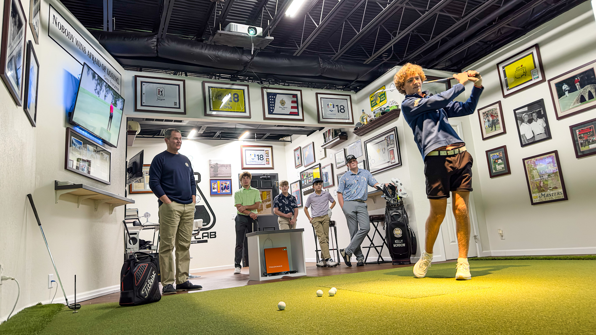 Kelly Morrow teaching a golf lesson at EagleSticks Golf Club