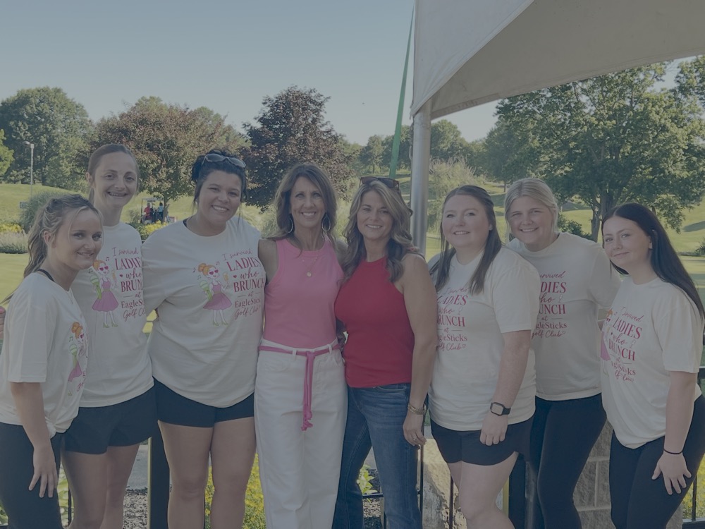 Ladies celebrating at Ladies Who Brunch Round 3 tailgate party at EagleSticks Golf Club